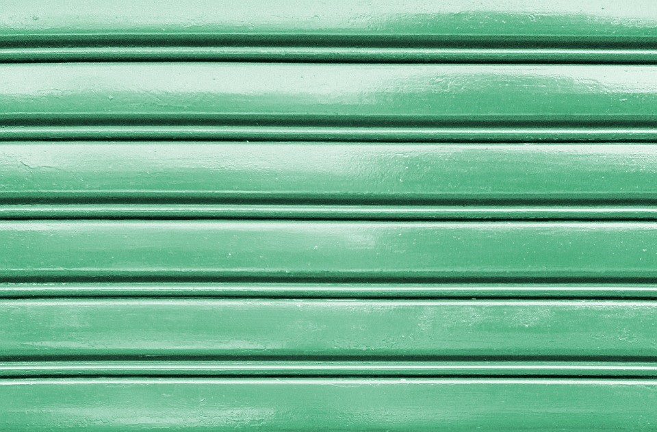 close up image of a green garage door